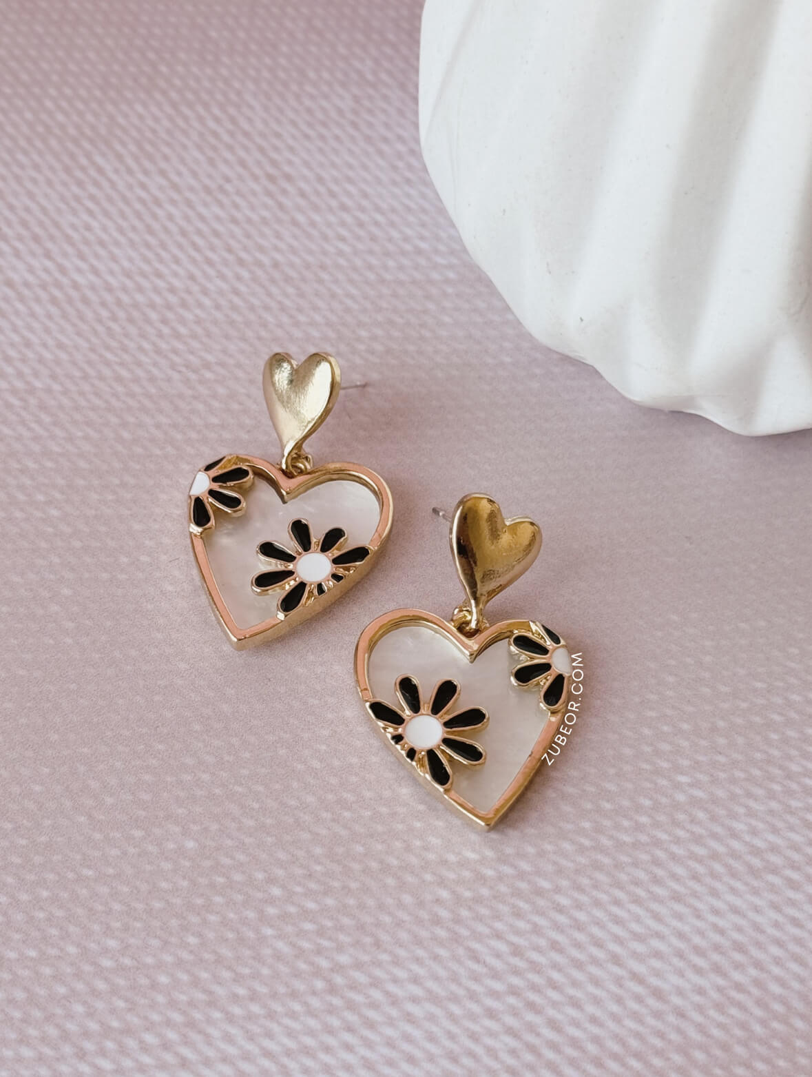Aretes cora flor negra 4