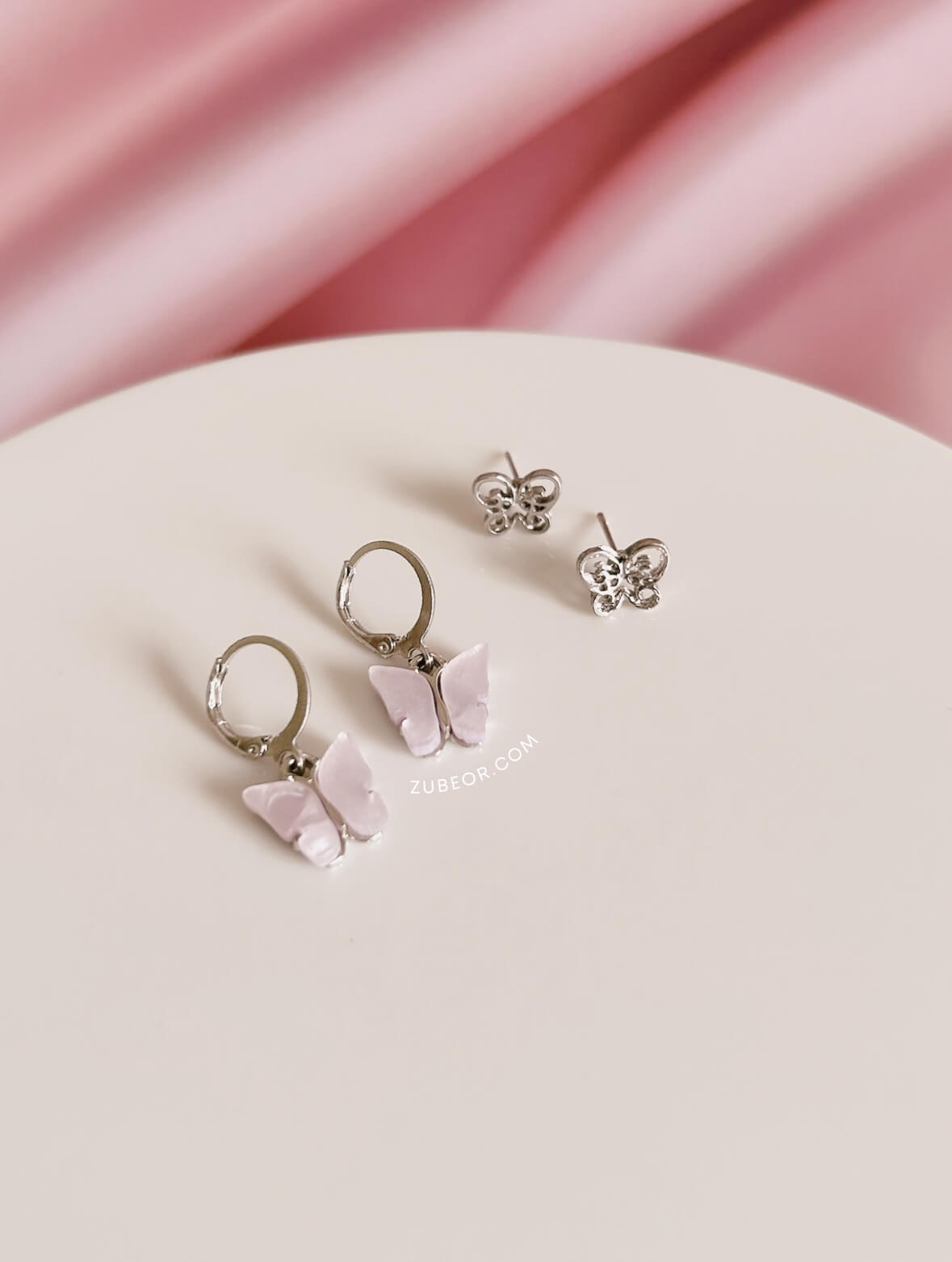 Set de aretes mariposas plateado 3