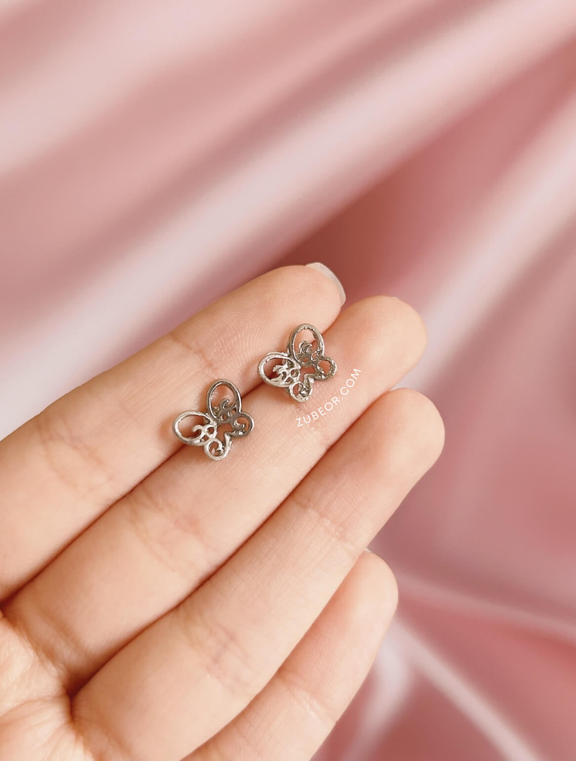 Set de aretes mariposas plateado 5
