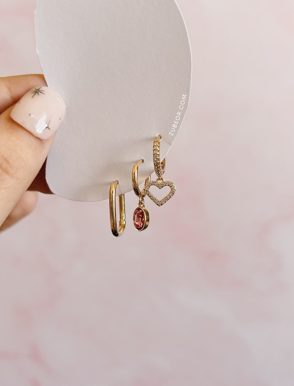 Set de aretes impares corazón y fucsia 2