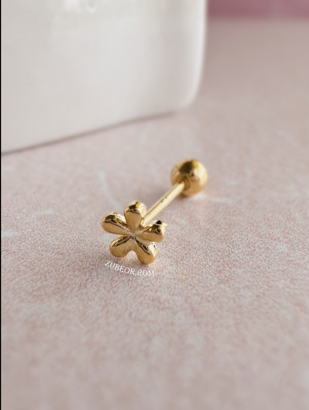 Piercing pequeña flor 3