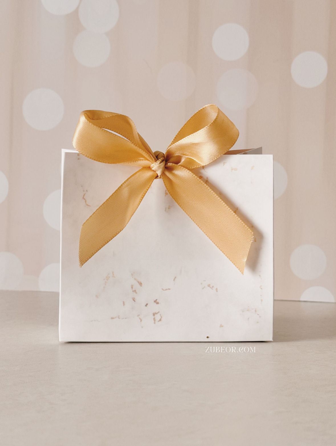 Empaque de regalo mármol dorado 4