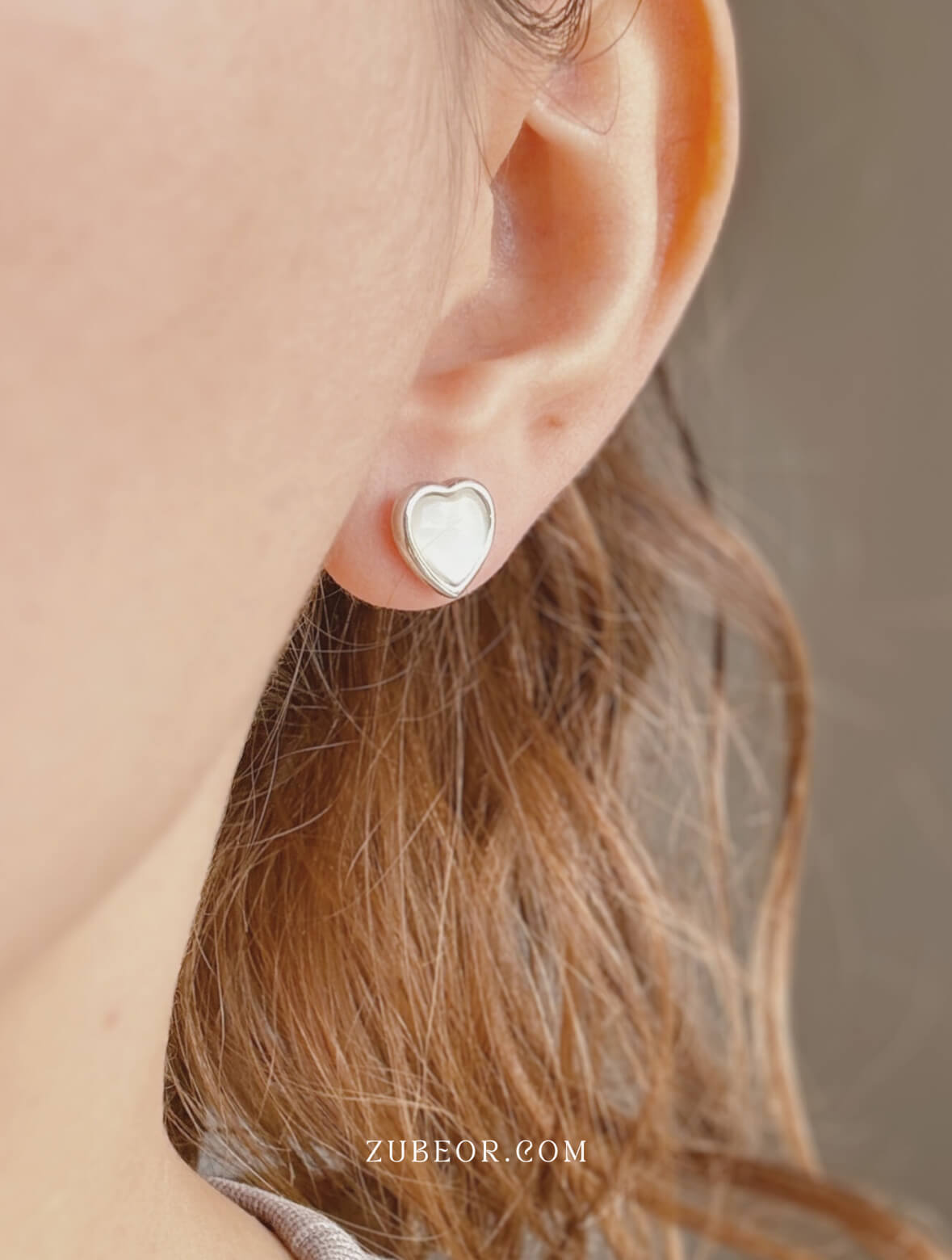 Aretes corazón resplandor blanco 3
