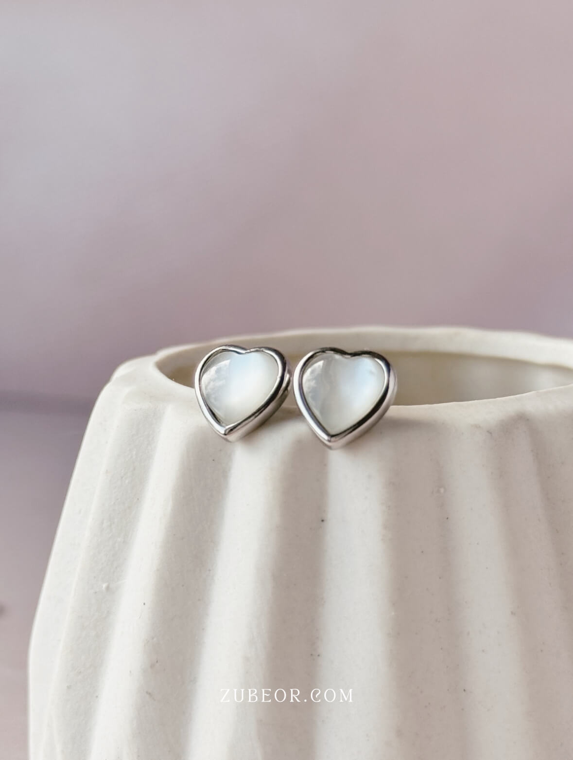 Aretes corazón resplandor blanco 2