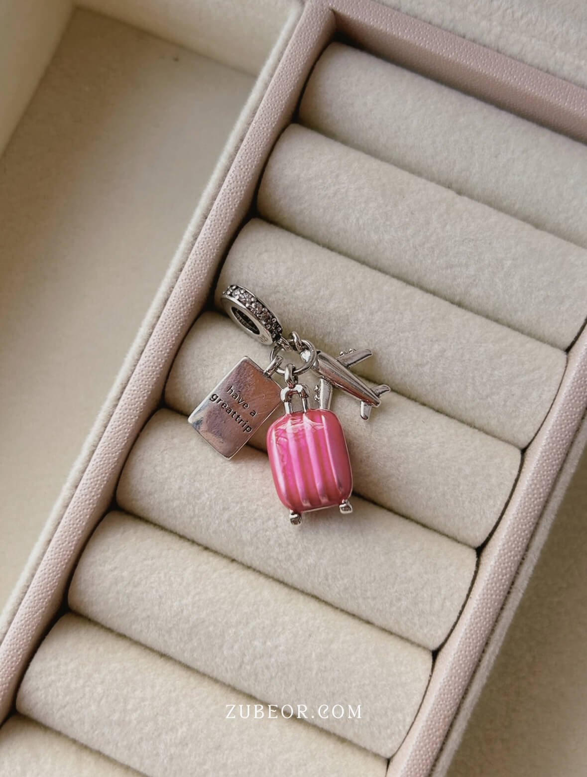 Charm de viaje rosa 3