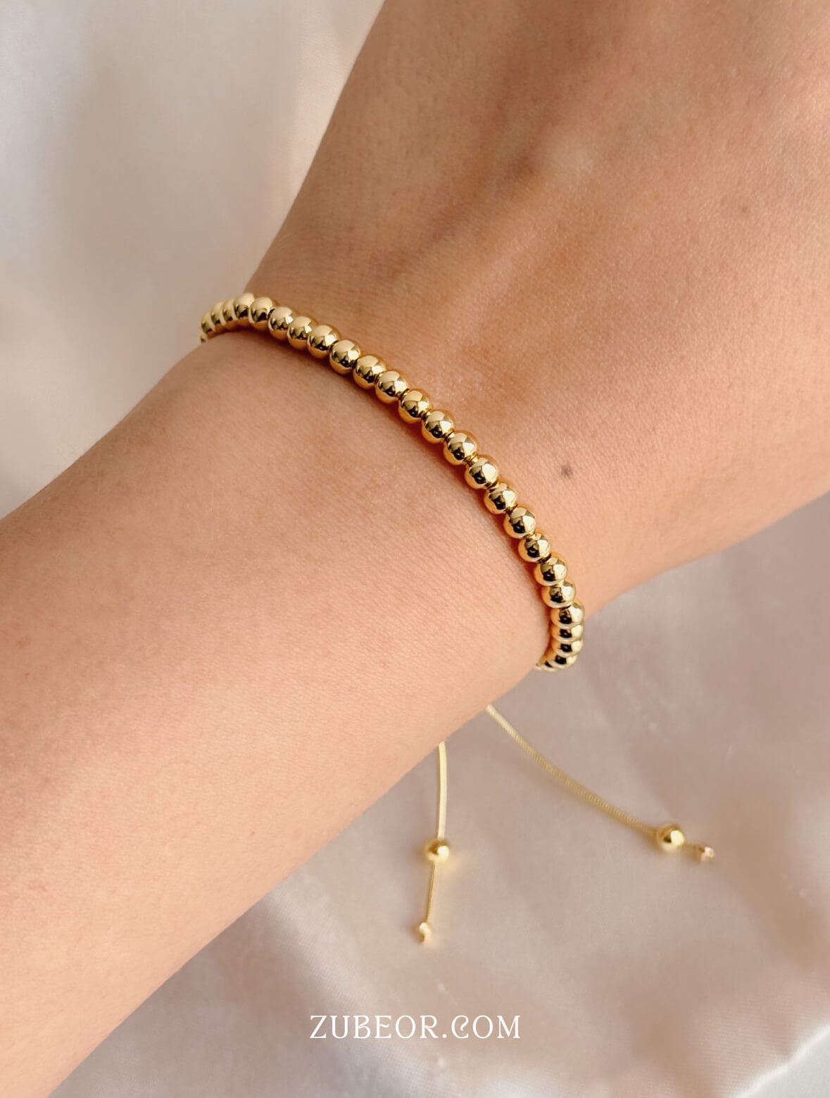 Pulsera esferas doradas 2
