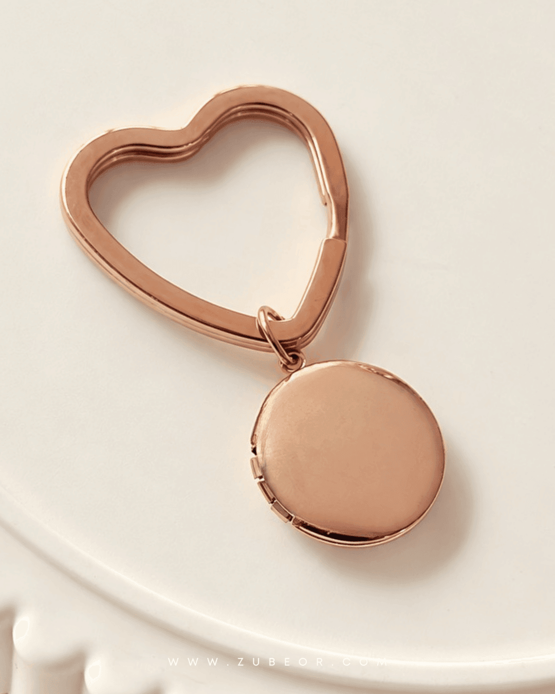 Llavero relicario rosegold 8